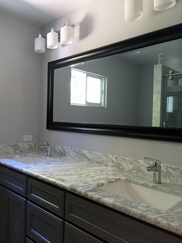 Marble topped vanity with undermount sinks Marble topped vanity with undermount sinks